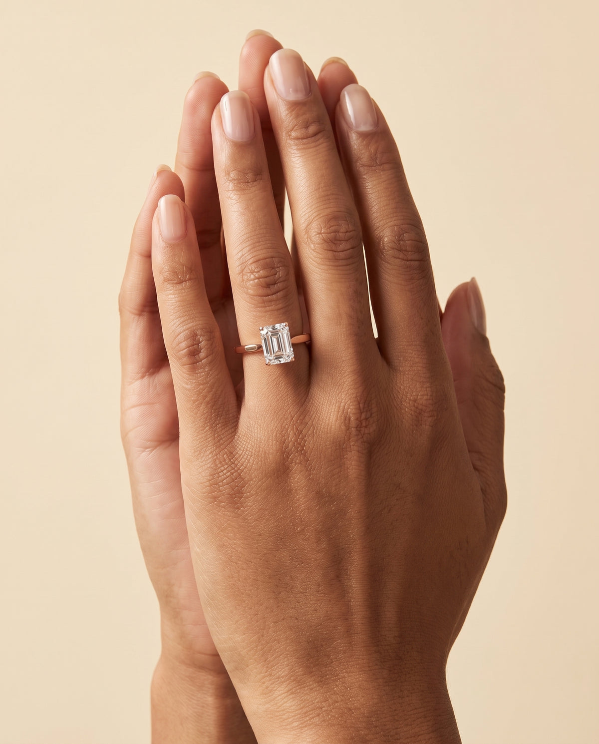 The Elena Timeless Graduated Beveled Shank Solitaire Emerald Cut Engagement Ring Setting in 14K Rose Gold