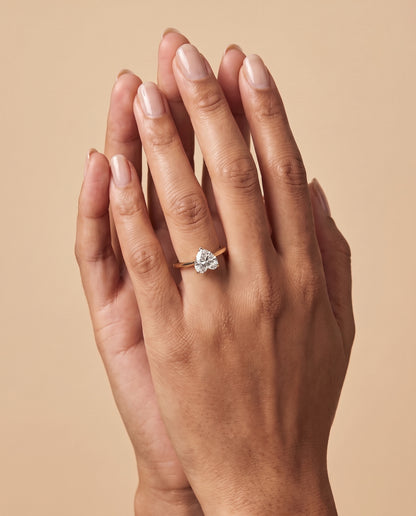 The Elena Timeless Graduated Beveled Shank Solitaire Heart Engagement Ring Setting in 18K Yellow Gold