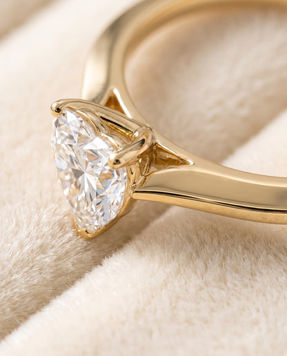 The Elena Timeless Graduated Beveled Shank Solitaire Heart Engagement Ring Setting in 18K Yellow Gold