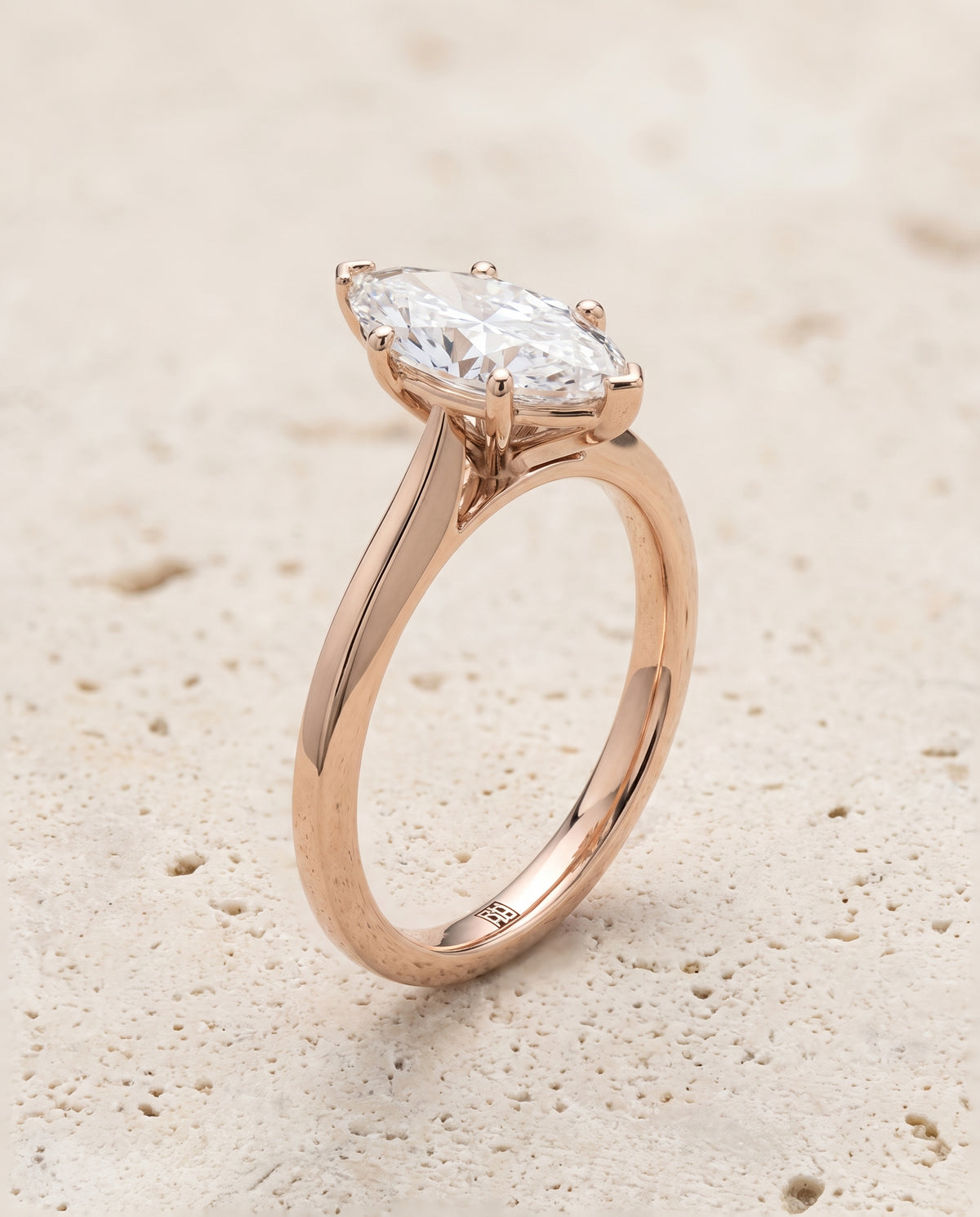 The Elena Timeless Graduated Beveled Shank Solitaire Marquise Engagement Ring Setting in 14K Rose Gold