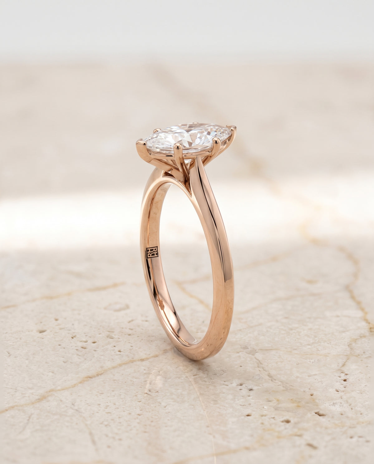 The Elena Timeless Graduated Beveled Shank Solitaire Marquise Engagement Ring Setting in 14K Rose Gold