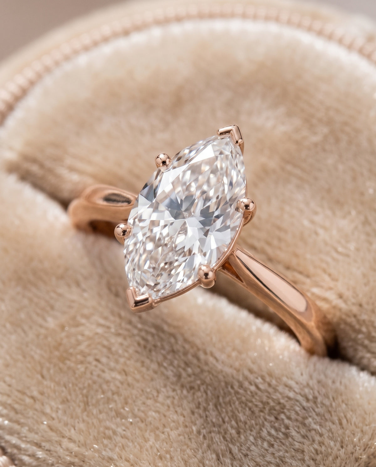 The Elena Timeless Graduated Beveled Shank Solitaire Marquise Engagement Ring Setting in 14K Rose Gold