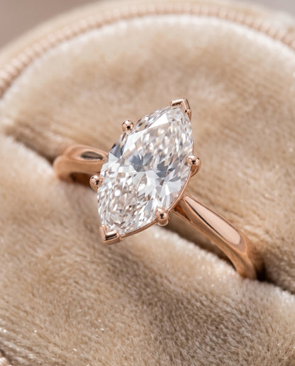 The Elena Timeless Graduated Beveled Shank Solitaire Marquise Engagement Ring Setting in 14K Rose Gold
