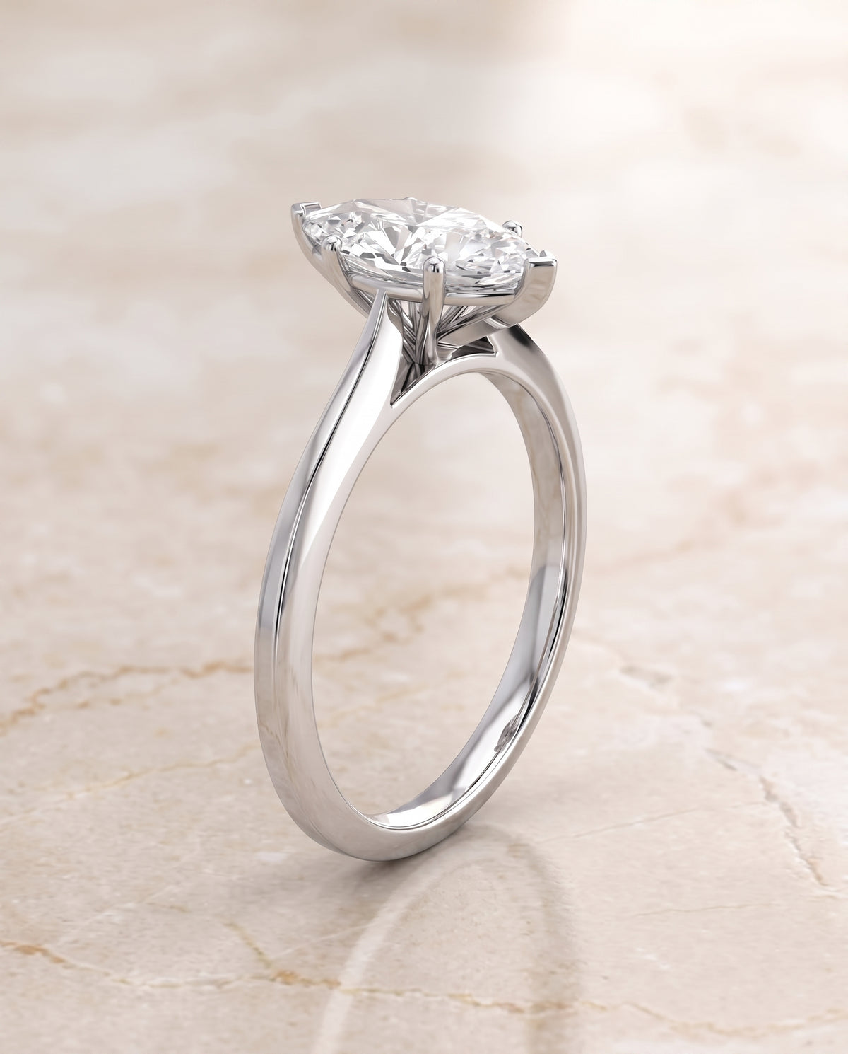 The Elena Timeless Graduated Beveled Shank Solitaire Marquise Engagement Ring Setting in 18K White Gold