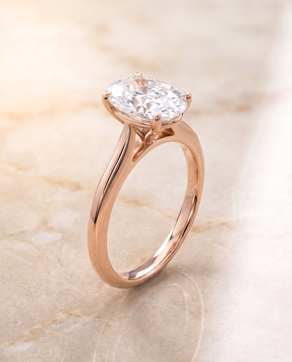 The Elena Timeless Graduated Beveled Shank Solitaire Oval Engagement Ring Setting in 14K Rose Gold