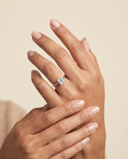The Elena Timeless Graduated Beveled Shank Solitaire Princess Cut Engagement Ring Setting in Platinum