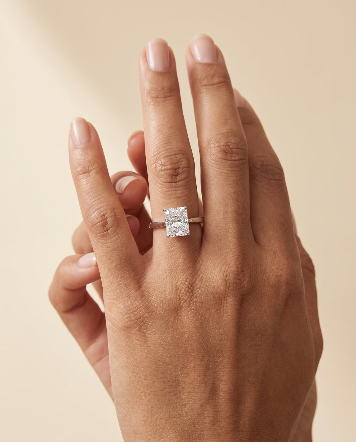 The Elena Timeless Graduated Beveled Shank Solitaire Radiant Cut Engagement Ring Setting in Platinum