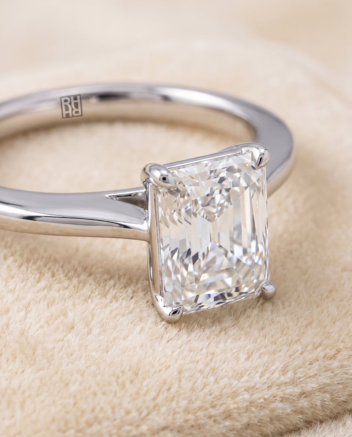 The Elena Timeless Graduated Beveled Shank Solitaire Radiant Cut Engagement Ring Setting in Platinum