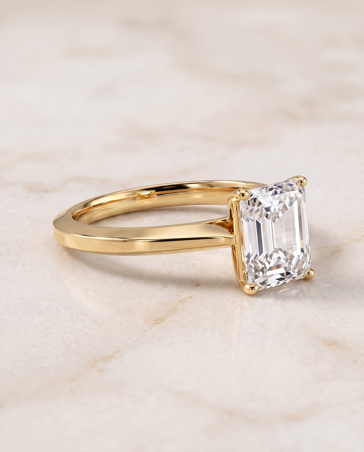 The Elena Timeless Graduated Beveled Shank Solitaire Radiant Cut Engagement Ring Setting in 18K Yellow Gold