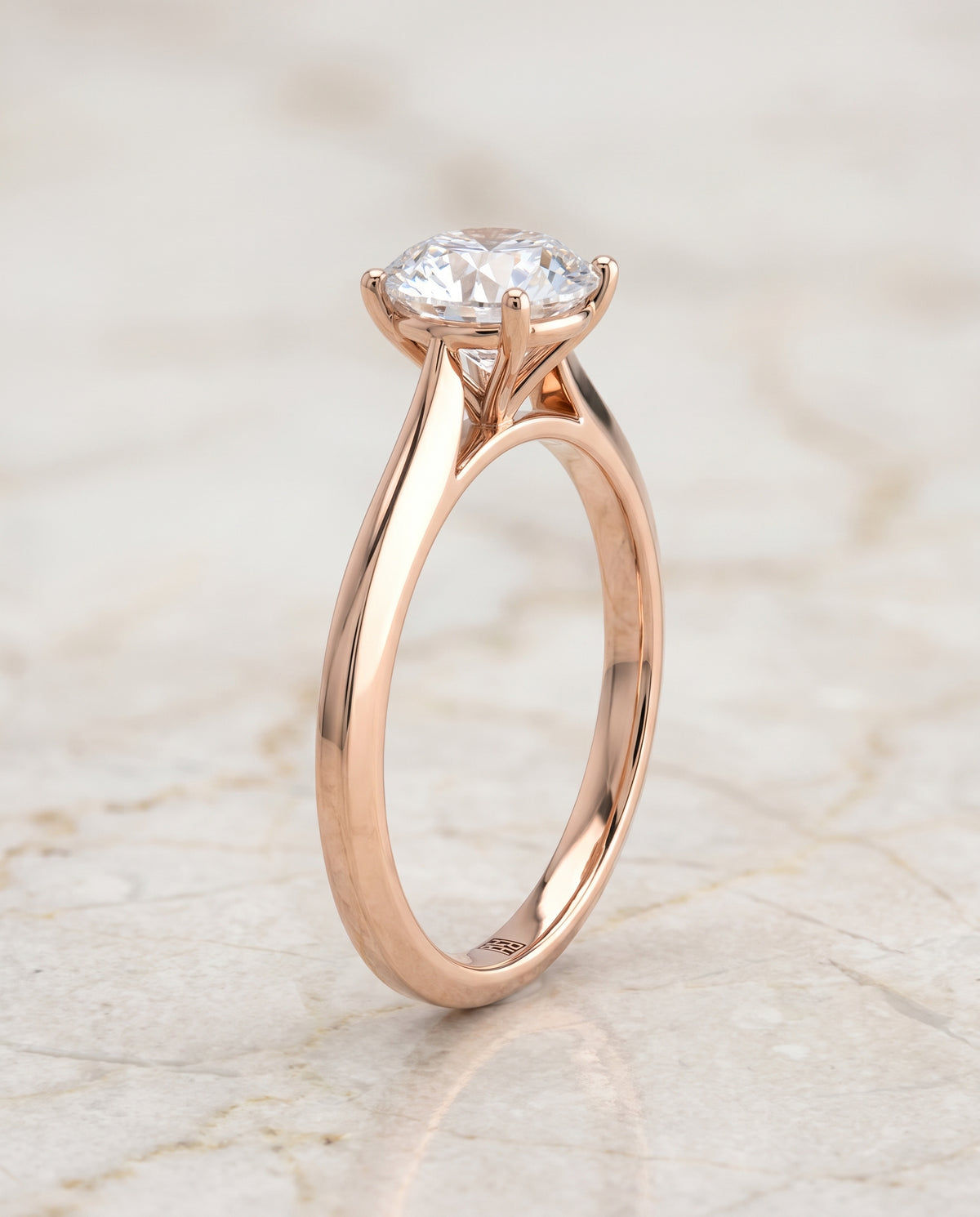 The Elena Timeless Graduated Beveled Shank Solitaire Round Engagement Ring Setting in 14K Rose Gold