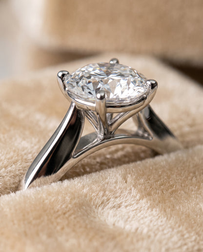 The Elena Timeless Graduated Beveled Shank Solitaire Round Engagement Ring Setting in 18K White Gold