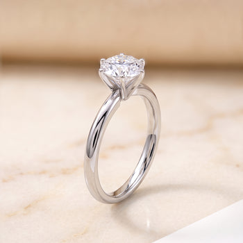 The Elettra Timeless Comfort Fit Six Prong Solitaire Round Engagement Ring Setting in Platinum