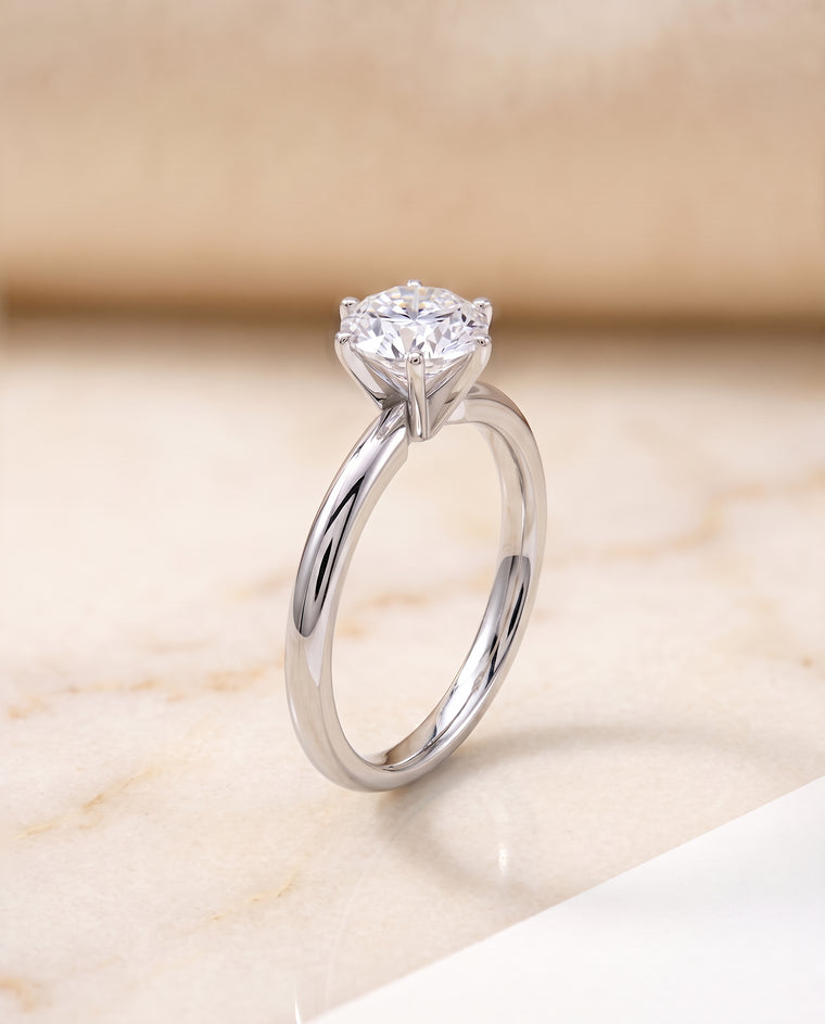 The Elettra Timeless Comfort Fit Six Prong Solitaire Round Engagement Ring Setting in Platinum
