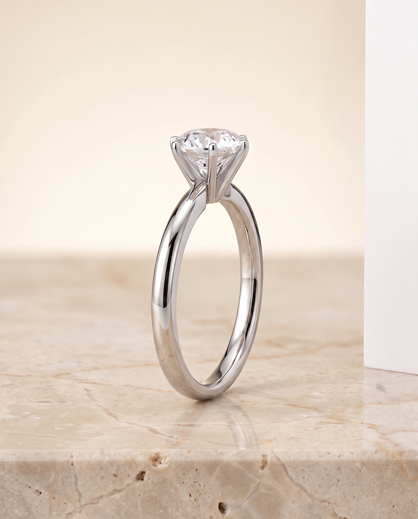 The Elettra Timeless Comfort Fit Six Prong Solitaire Round Engagement Ring Setting in Platinum