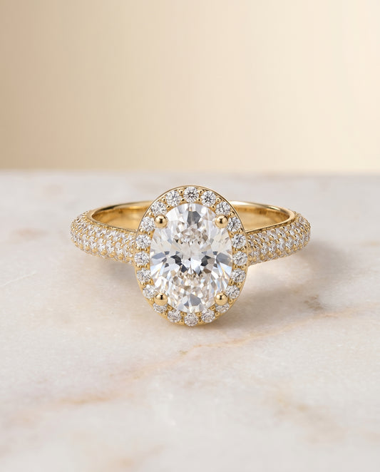 The Ella Halo Engagement Ring Setting for Oval Diamonds in 18K Yellow Gold
