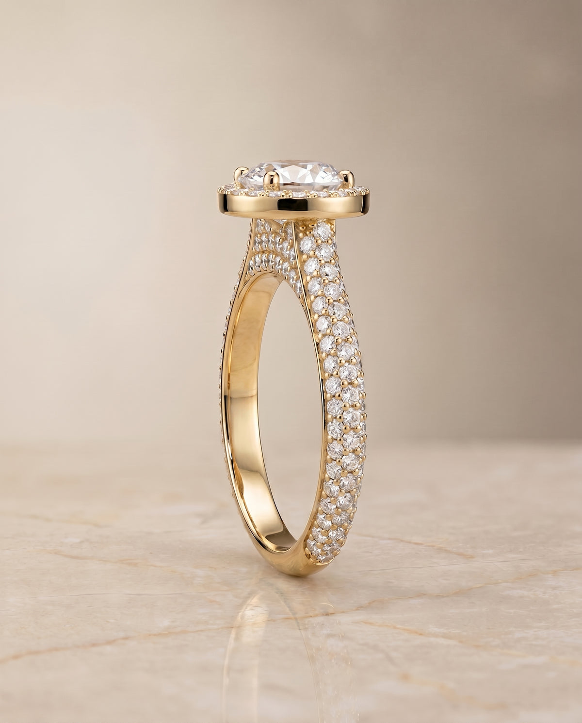 The Ella setting for round diamonds, made to order in 18K Yellow Gold | RockHer