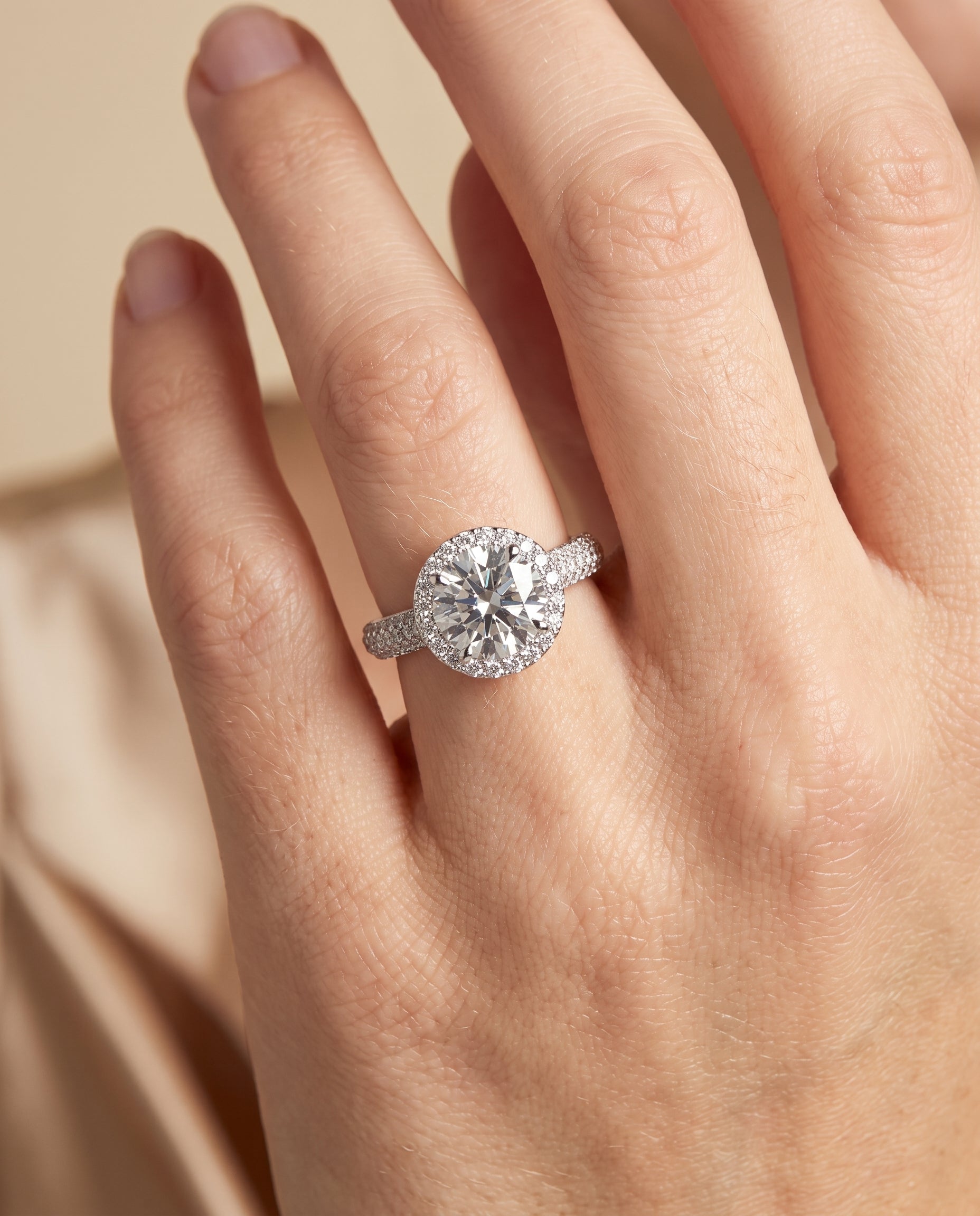 The Ella engagement ring setting in Platinum, micro pavé triple row halo design | RockHer