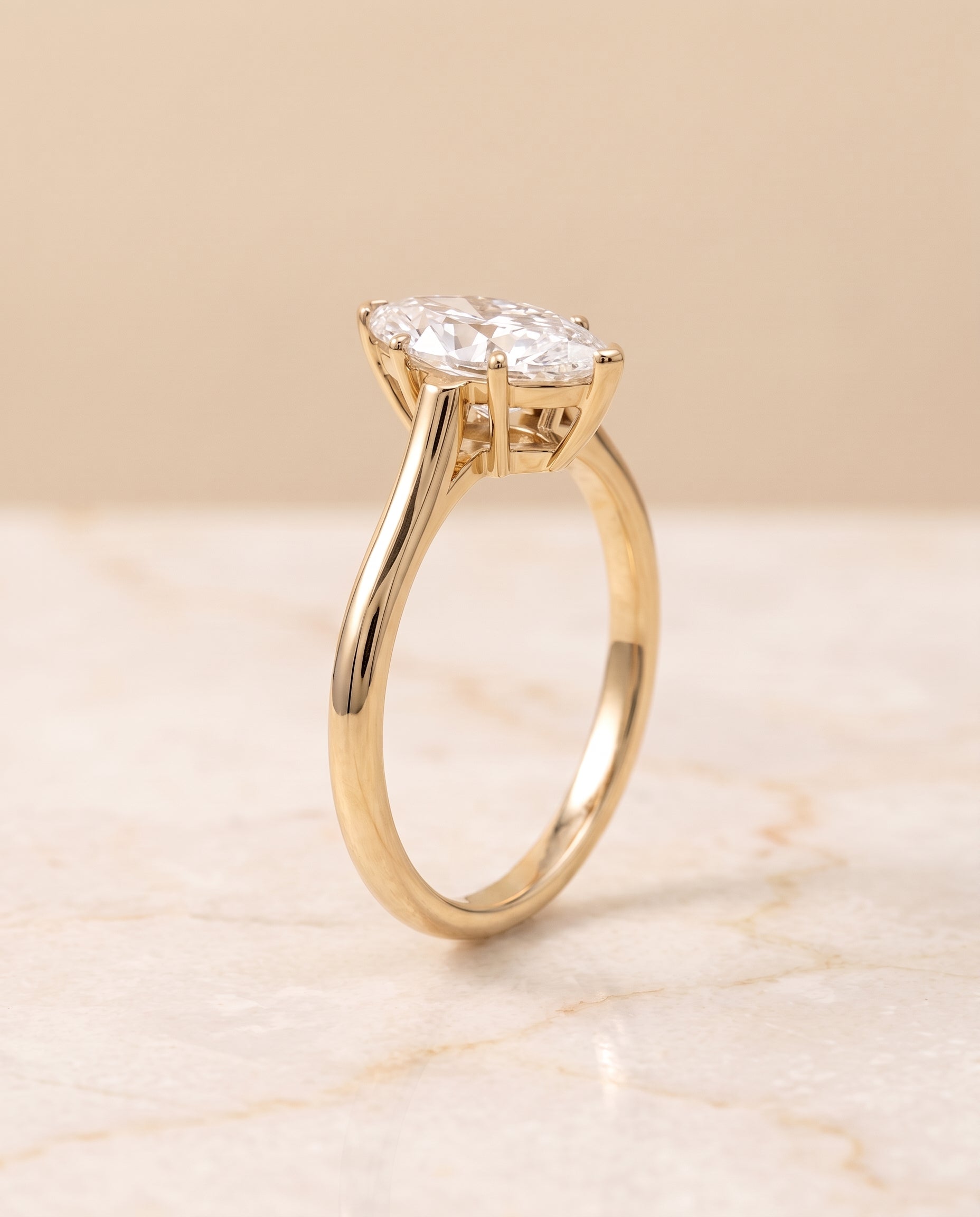 The Ellie setting for marquise diamonds, made to order in 18K Yellow Gold | RockHer