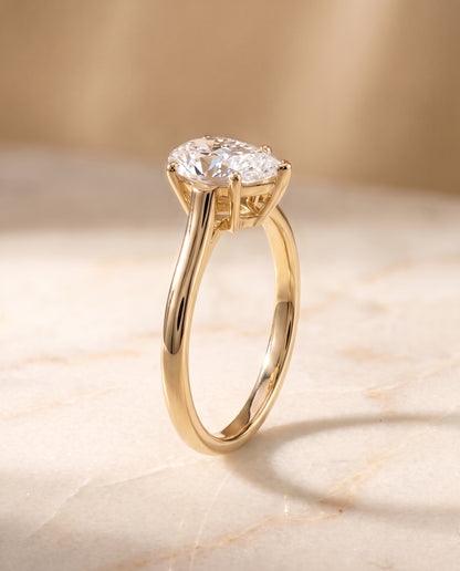 The Ellie Cathedral Comfort Fit Solitaire Pear Engagement Ring Setting in 18K Yellow Gold