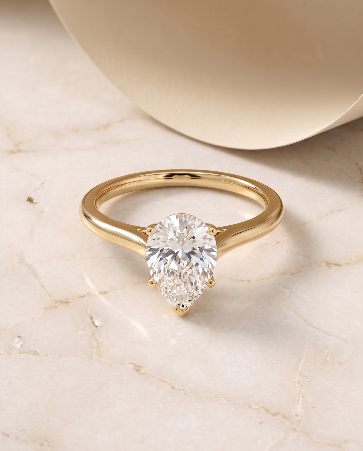 The Ellie pear engagement ring setting in 18K Yellow Gold | RockHer