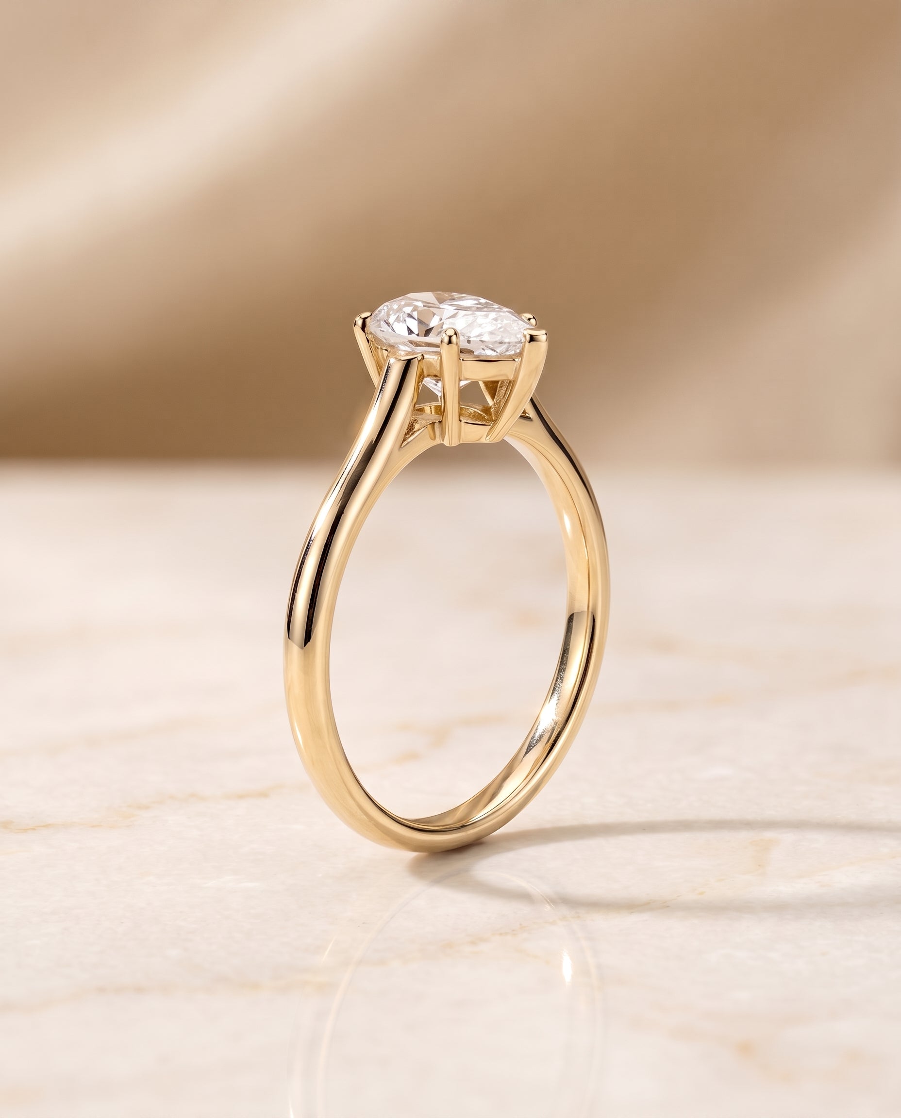 The Ellie setting for pear diamonds, made to order in 18K Yellow Gold | RockHer