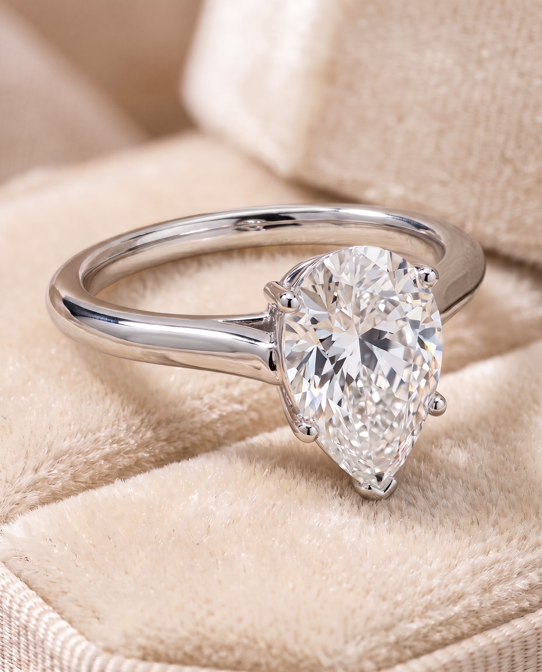 The Ellie Cathedral Comfort Fit Solitaire Pear Engagement Ring Setting in 18K White Gold