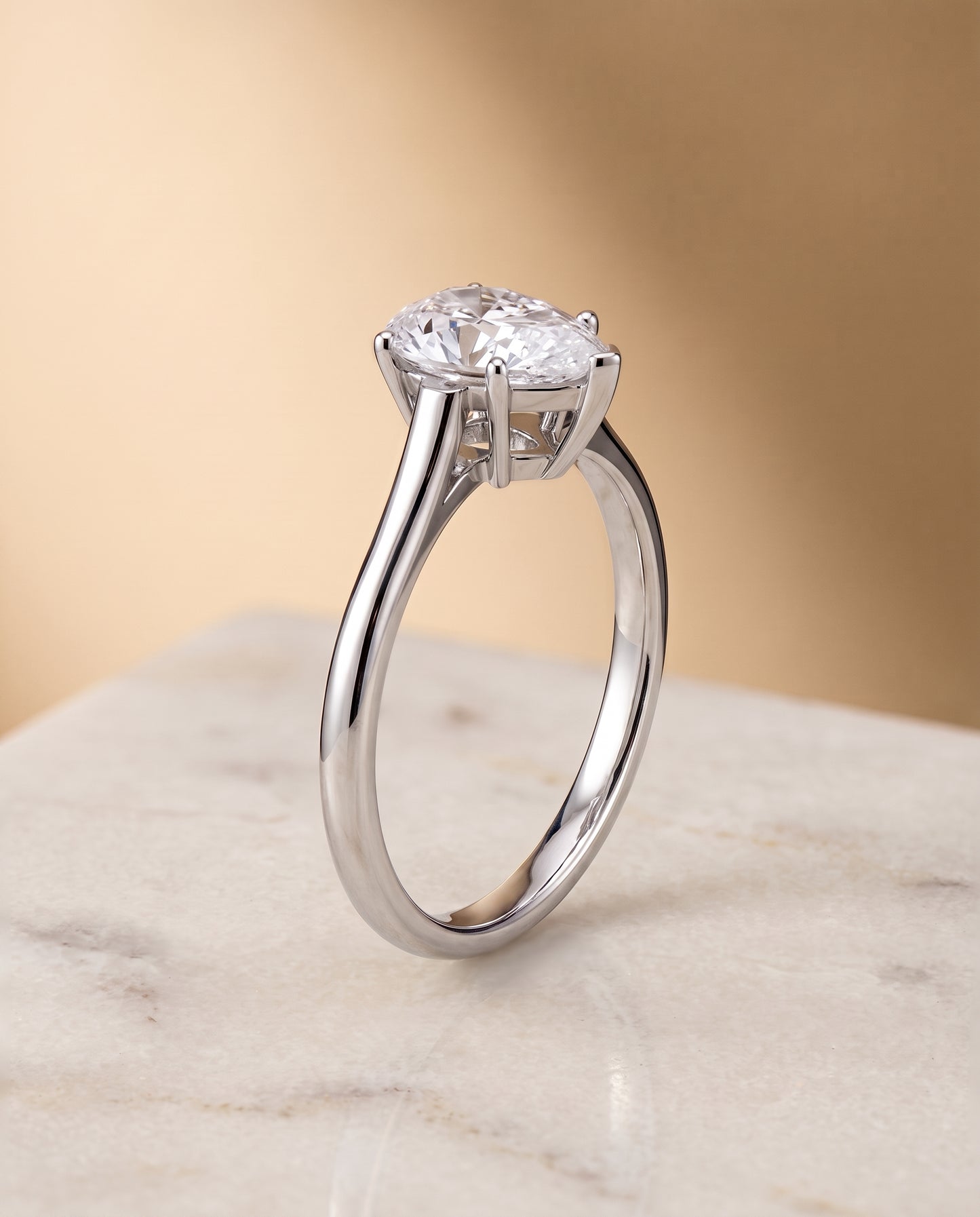 The Ellie Cathedral Comfort Fit Solitaire Pear Engagement Ring Setting in 18K White Gold