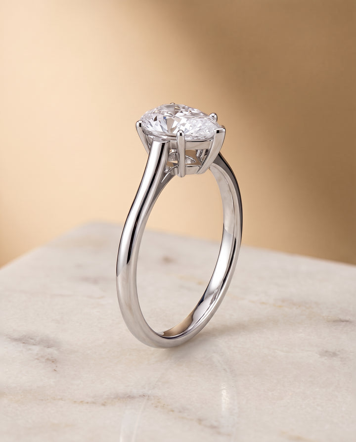 The Ellie Cathedral Comfort Fit Solitaire Pear Engagement Ring Setting in 18K White Gold