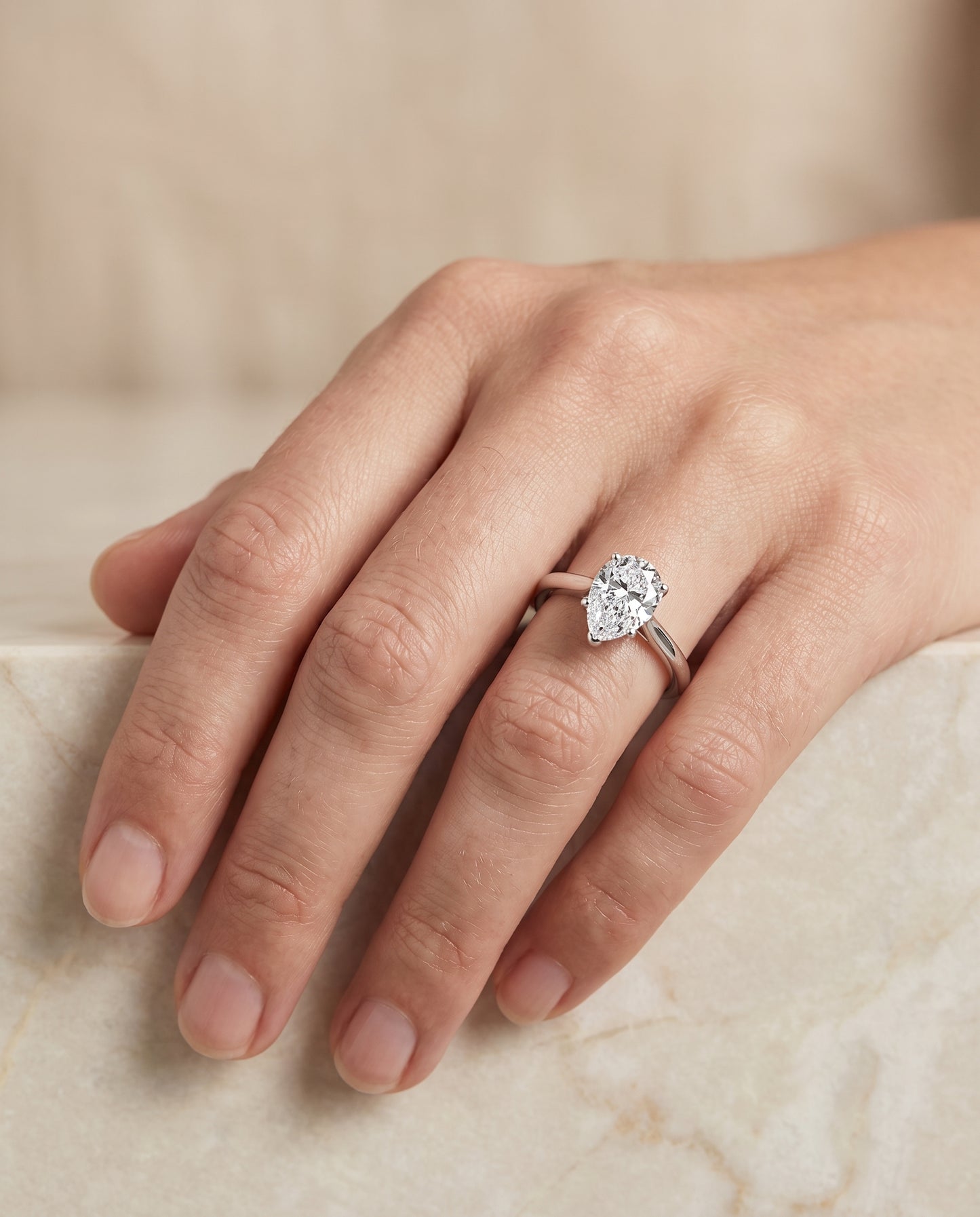 The Ellie Cathedral Comfort Fit Solitaire Pear Engagement Ring Setting in 18K White Gold