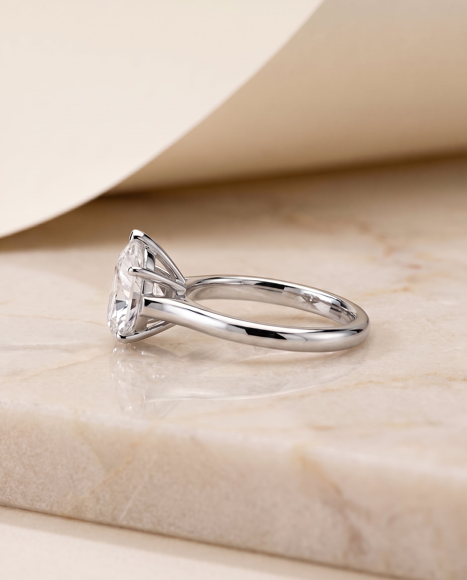 The Ellie Cathedral Comfort Fit Solitaire Pear Engagement Ring Setting in 18K White Gold