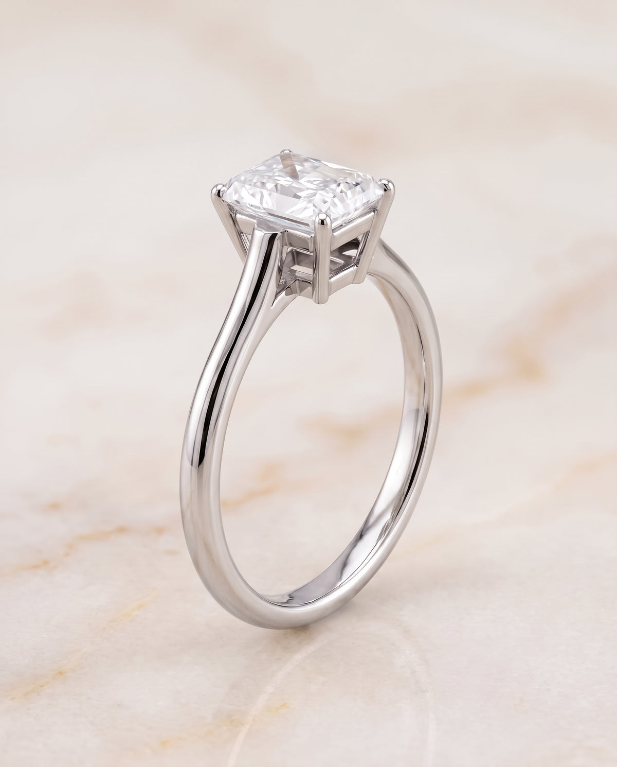 The Ellie Cathedral Comfort Fit Solitaire Radiant Cut Engagement Ring Setting in 18K White Gold