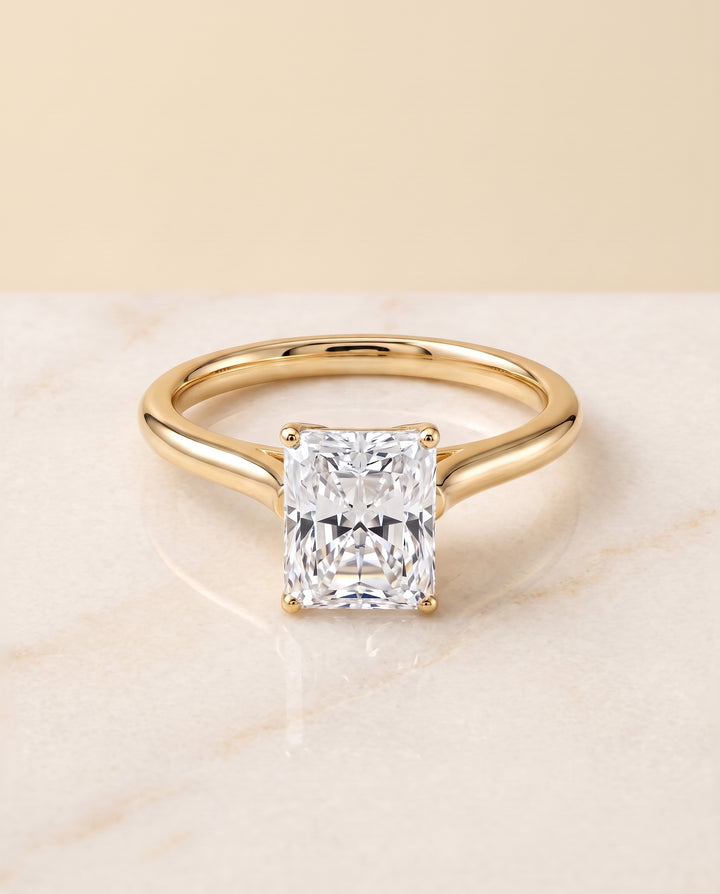 The Ellie Cathedral Comfort Fit Solitaire Radiant Cut Engagement Ring Setting in 18K Yellow Gold