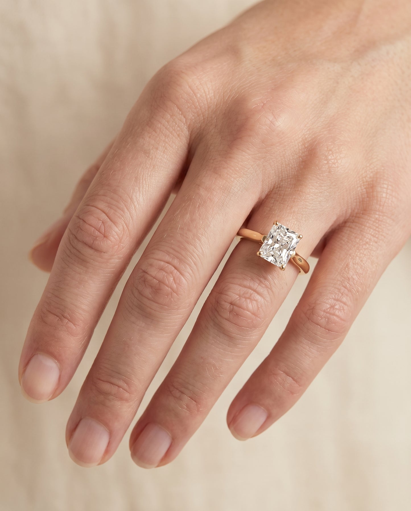 The Ellie Cathedral Comfort Fit Solitaire Radiant Cut Engagement Ring Setting in 18K Yellow Gold
