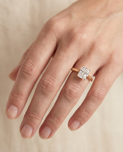 The Ellie Cathedral Comfort Fit Solitaire Radiant Cut Engagement Ring Setting in 18K Yellow Gold
