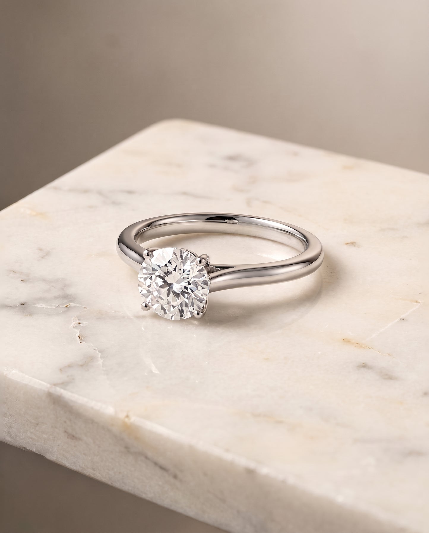 The Ellie Cathedral Comfort Fit Solitaire Round Engagement Ring Setting in 18K White Gold