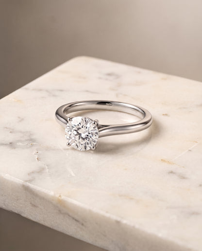 The Ellie Cathedral Comfort Fit Solitaire Round Engagement Ring Setting in 18K White Gold