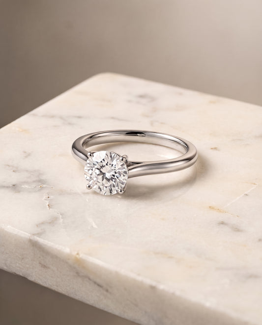 The Ellie Cathedral Comfort Fit Solitaire Round Engagement Ring Setting in 18K White Gold