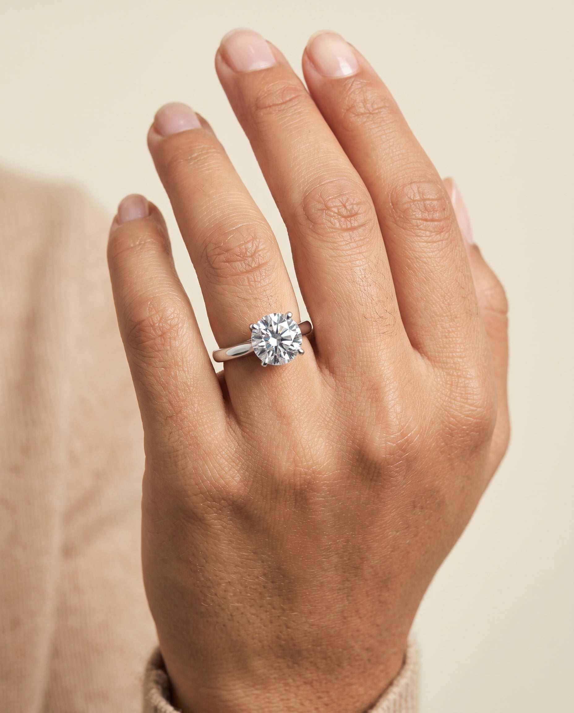 The Ellie engagement ring setting in Platinum, cathedral comfort fit solitaire design | RockHer