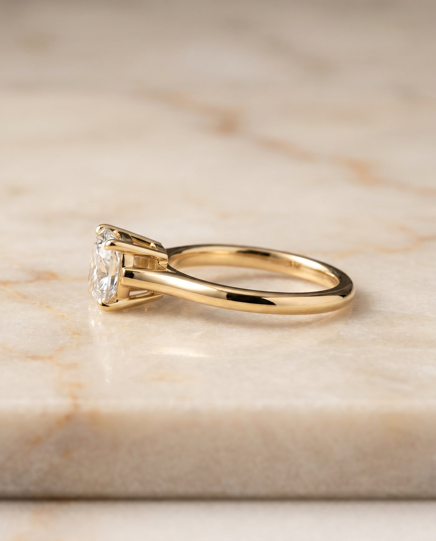 The Ellie Cathedral Comfort Fit Solitaire Cushion Cut Engagement Ring Setting in 18K Yellow Gold