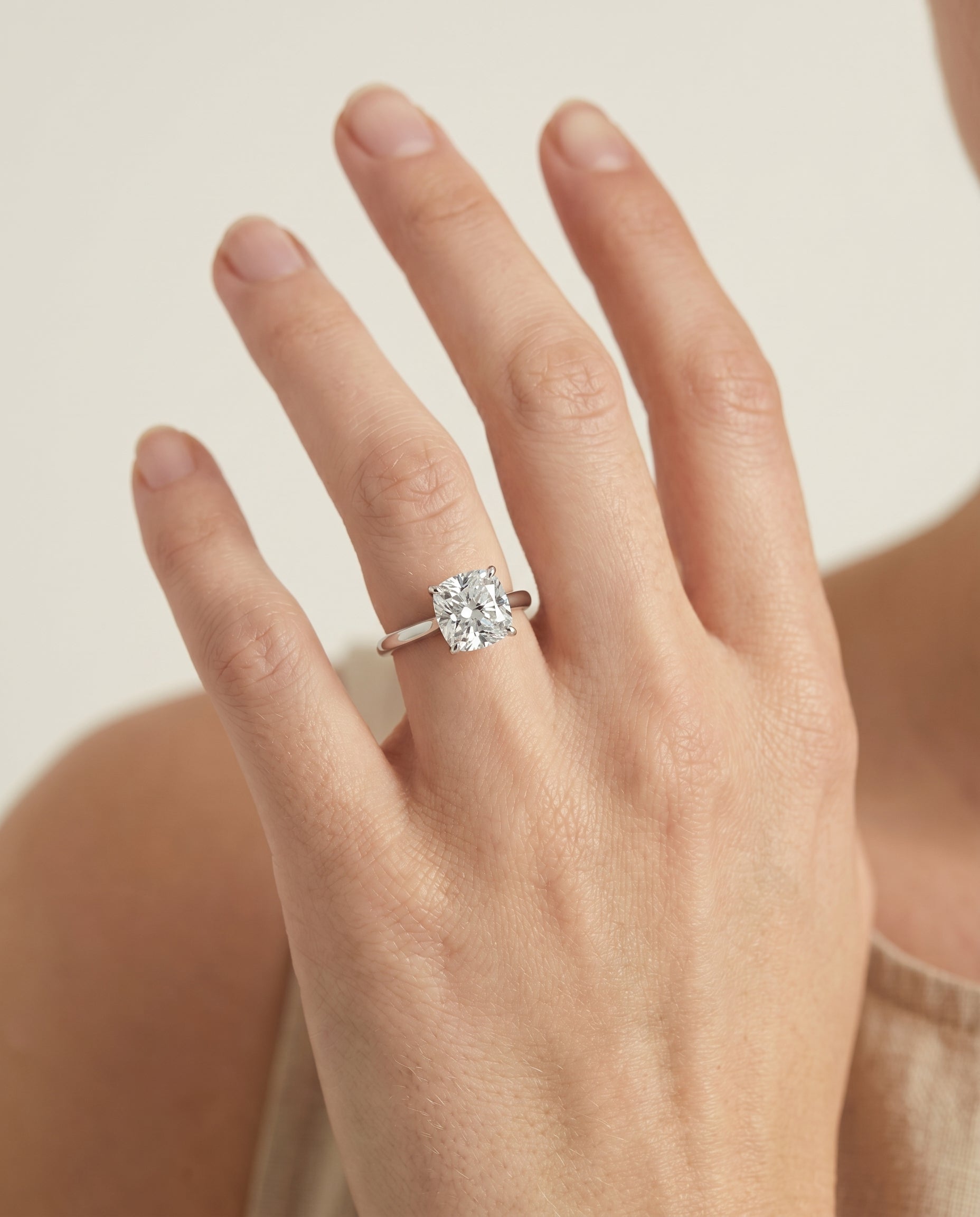 The Ellie engagement ring setting in Platinum, cathedral comfort fit solitaire cut design | RockHer
