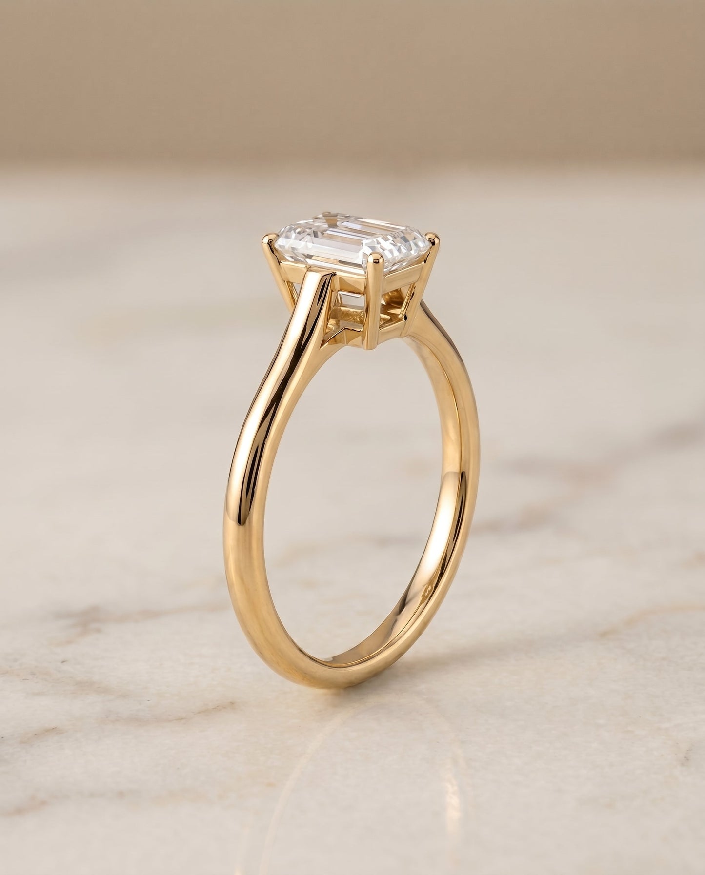 Ellie Select Solitaire Emerald Cut Lab Diamond Engagement Ring in 18K Yellow Gold, front view | RockHer