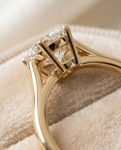 The Ellie Cathedral Comfort Fit Solitaire Oval Engagement Ring Setting in 18K Yellow Gold