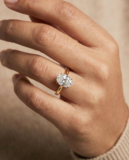 Ellie Select Solitaire Oval Lab Diamond Engagement Ring in 18K Yellow Gold, shown on hand | RockHer