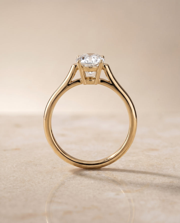 The Ellie Solitaire Engagement Ring Setting for Oval Diamonds in 18K Yellow Gold