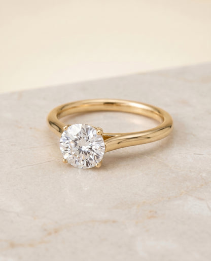 The Ellie Cathedral Comfort Fit Solitaire Round Engagement Ring Setting in 18K Yellow Gold