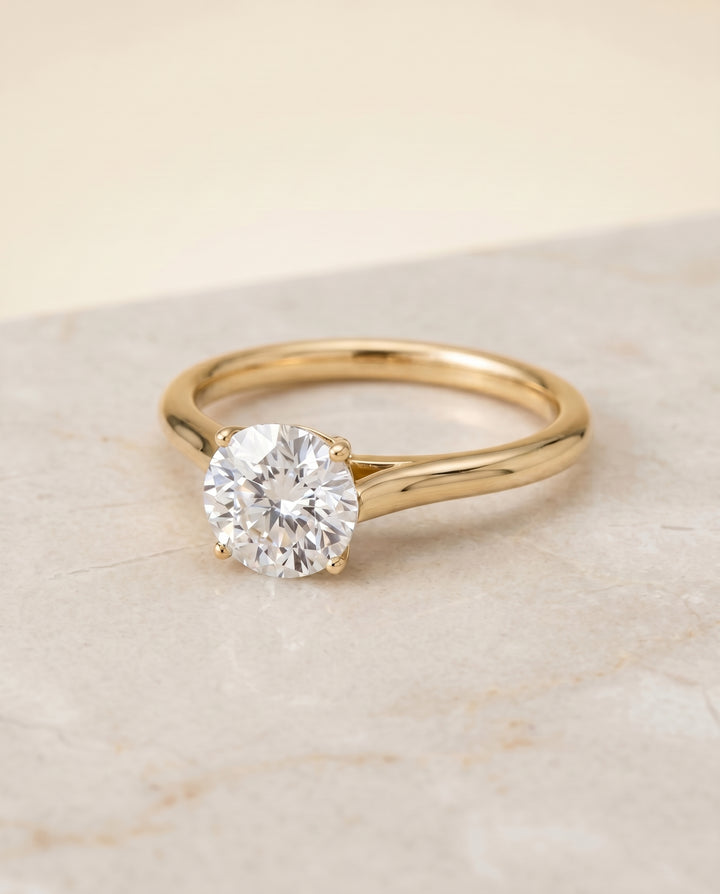 The Ellie Cathedral Comfort Fit Solitaire Round Engagement Ring Setting in 18K Yellow Gold