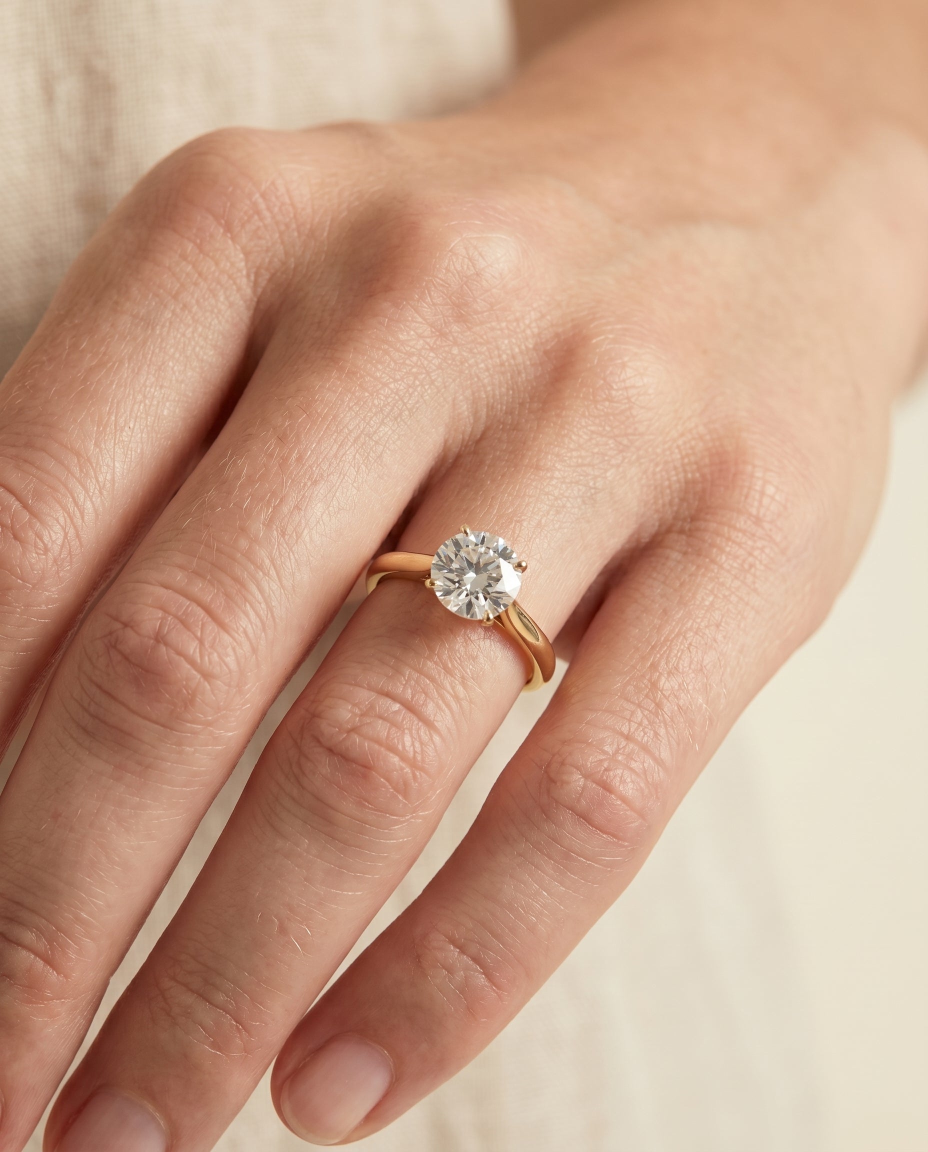 The Ellie engagement ring setting in 18K Yellow Gold, cathedral comfort fit solitaire design | RockHer