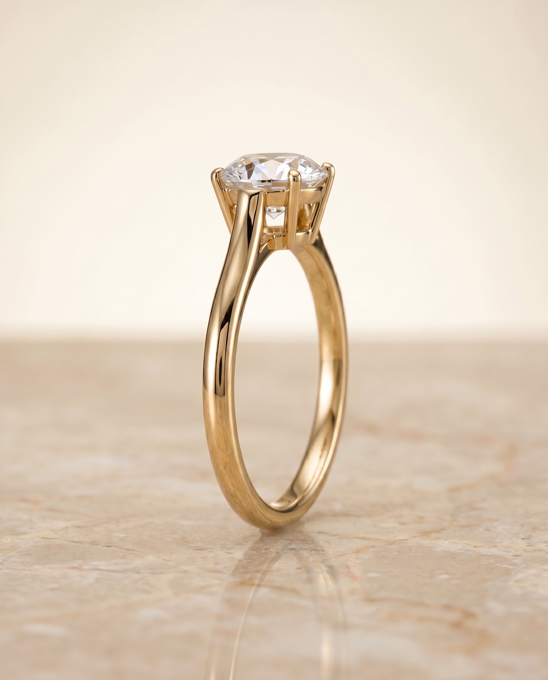 The Ellie setting for round diamonds, made to order in 18K Yellow Gold | RockHer