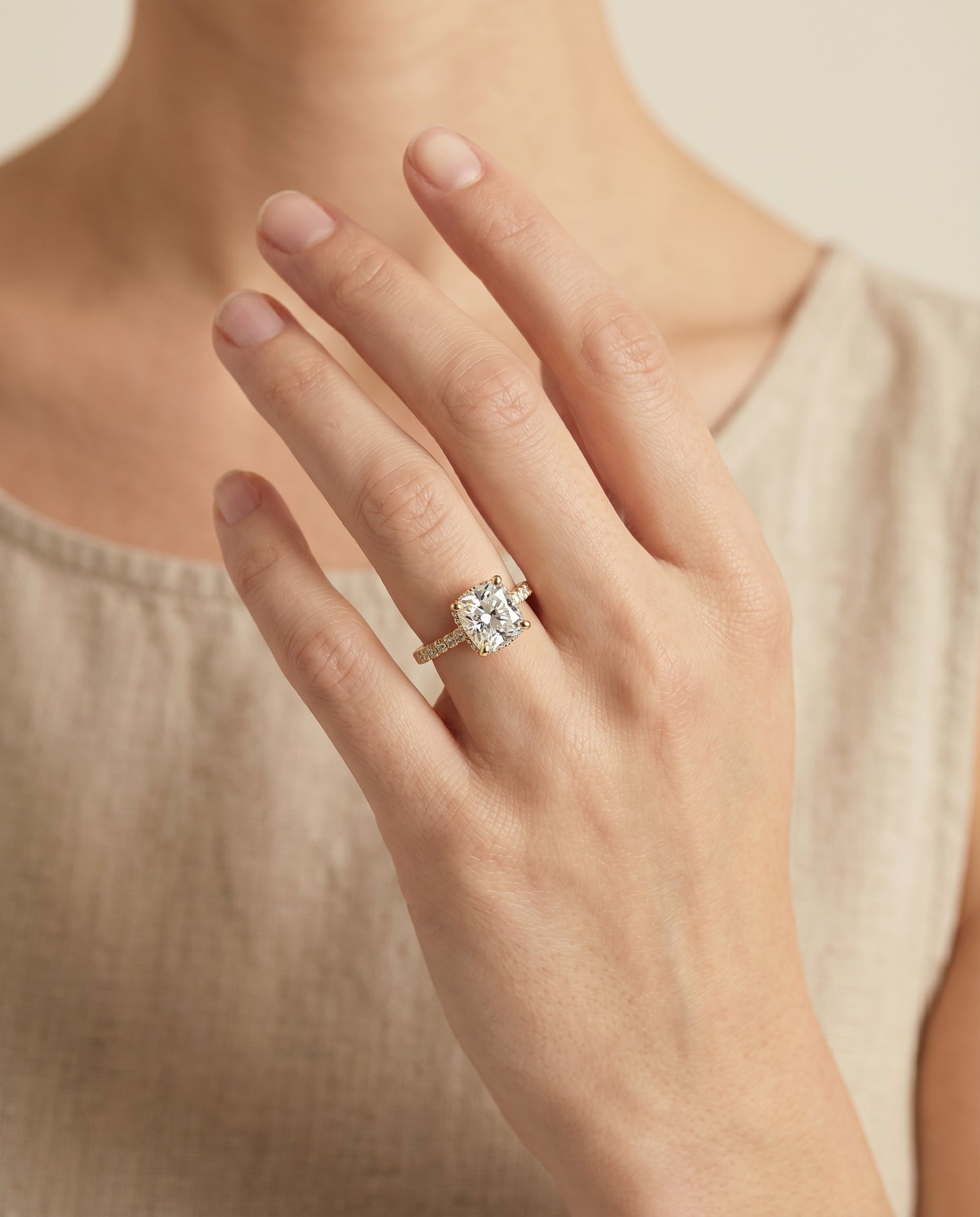 The Elliott engagement ring setting in 18K Yellow Gold, hidden halo pavé cut design | RockHer