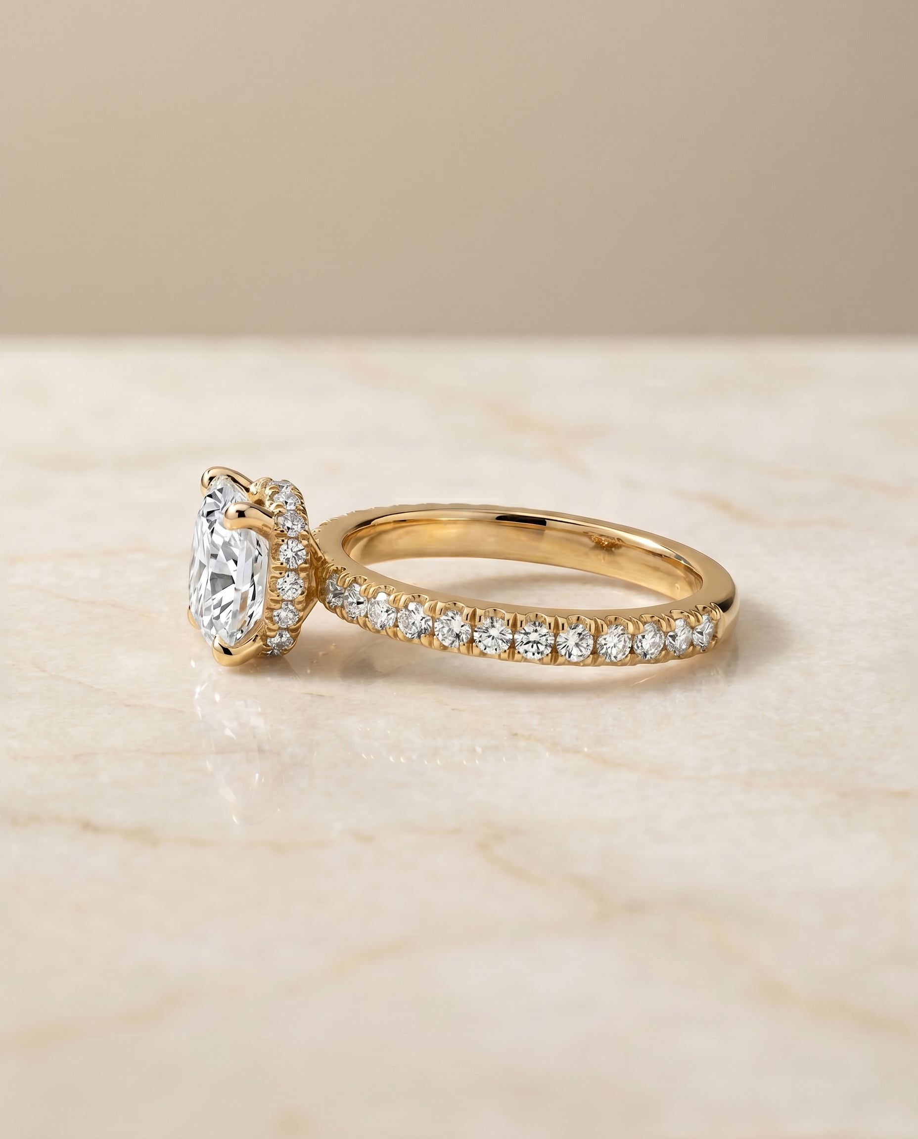 The Elliott setting for cushion diamonds, made to order in 18K Yellow Gold | RockHer